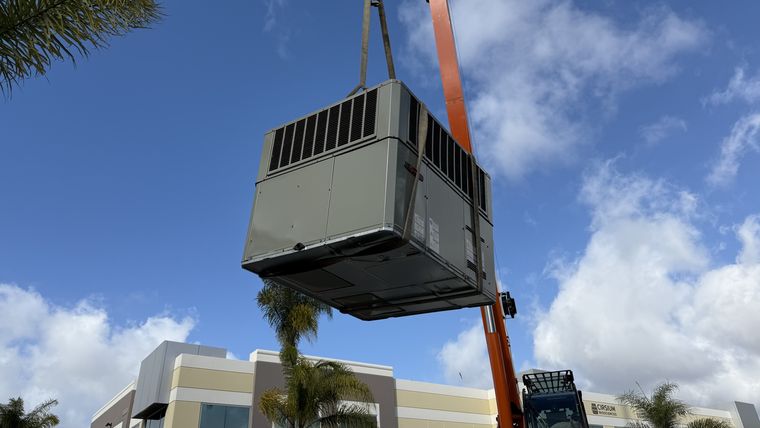 New package unit hoisted by crane