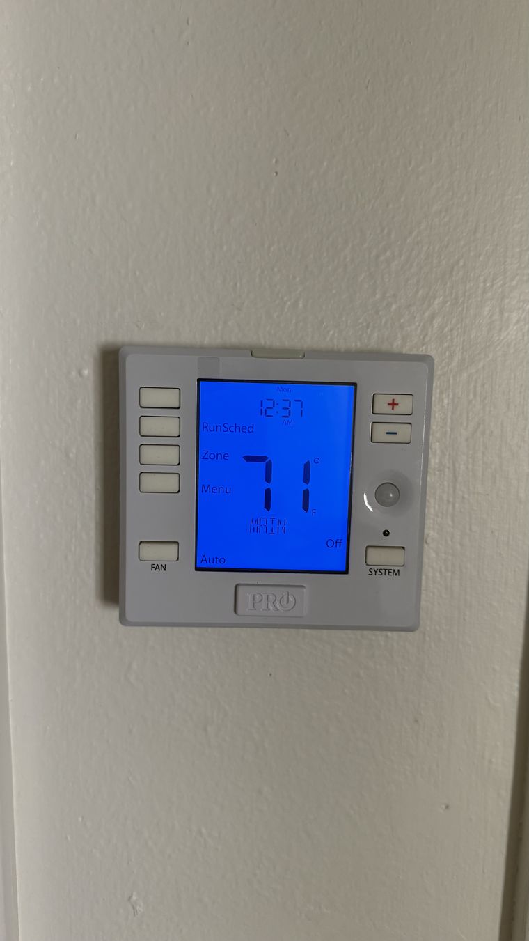 PRO wall thermostat showing 71 degrees